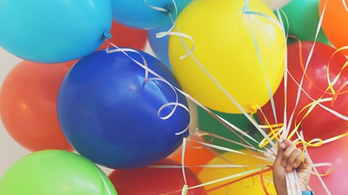 Multi-coloured balloons.