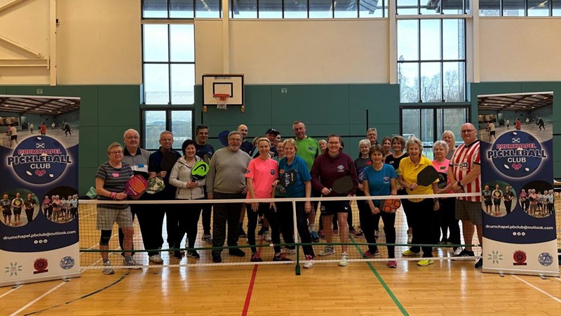 A group of people at Drumchapel after playing pickleball